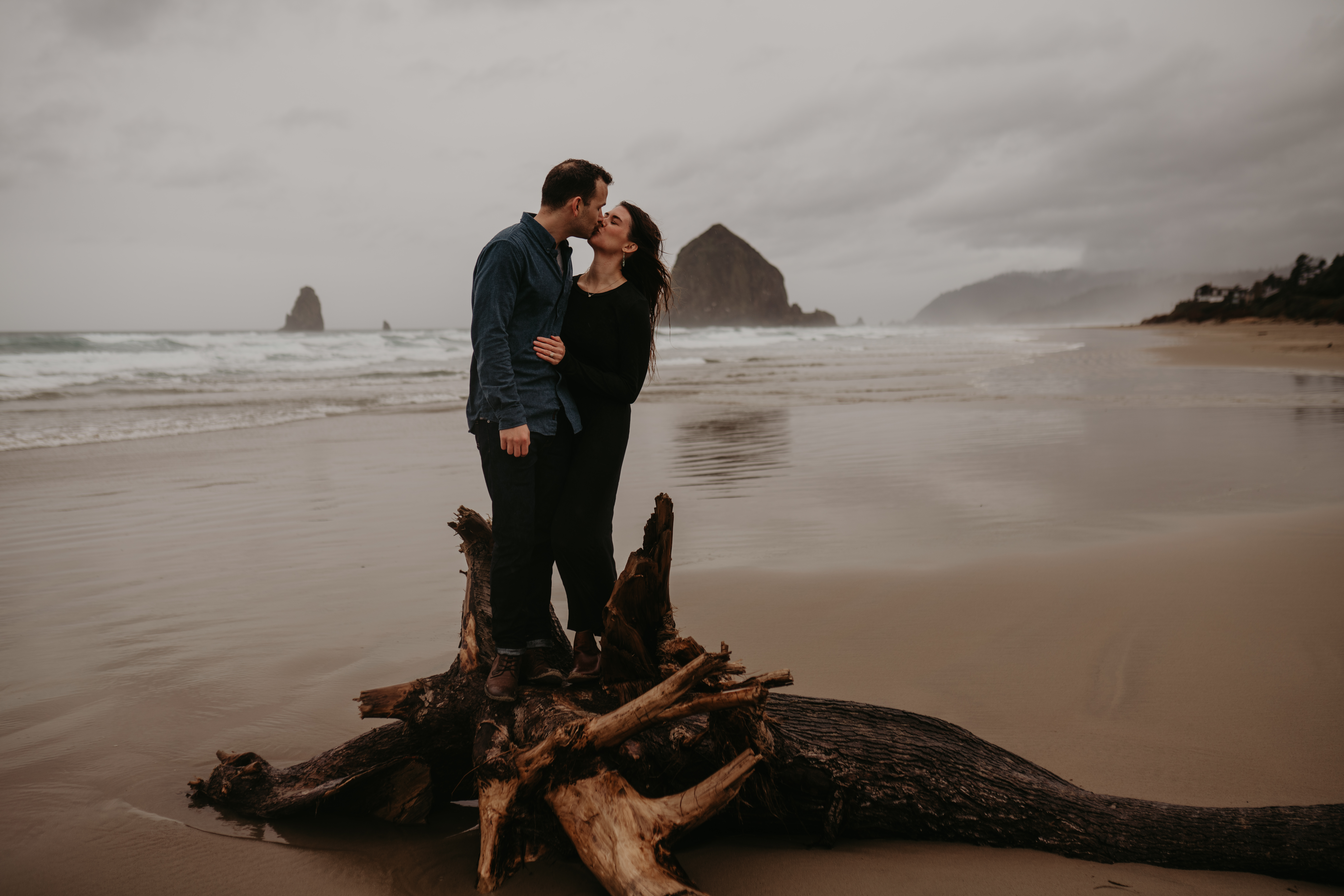cannon beach oregon engagment session couples photoshoot pdx pnw hug point wedding photography photographer ocean haystack rock dallas dfw texas anniversary session moody rainy day raining cloudy